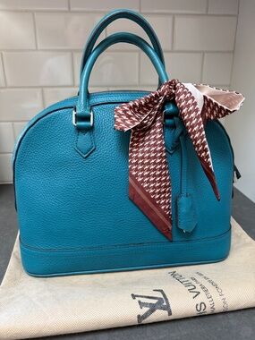 Authentic Louis Vuitton Alma PM Taurillon Blue Leather